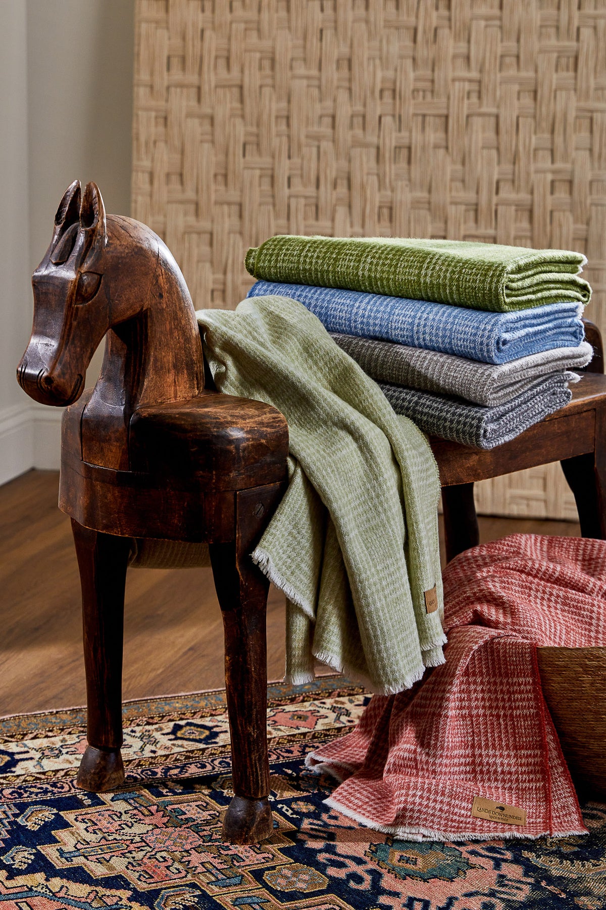 Sutton Plaid throw blanket stack on bench