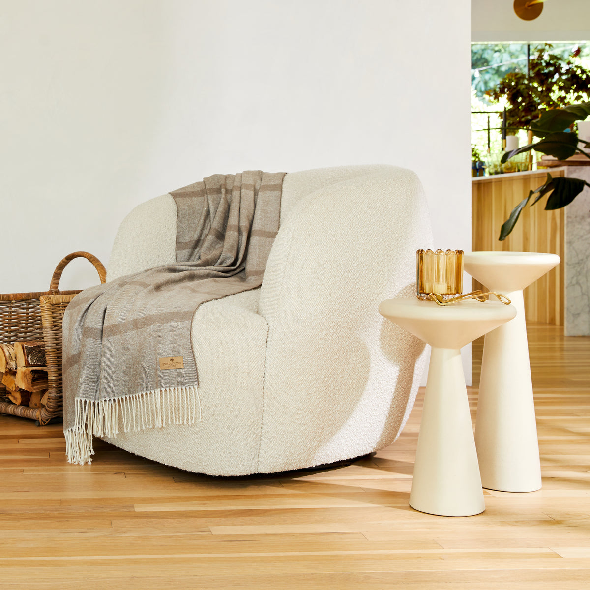 montauk stripe herringbone throw on boucle chair
